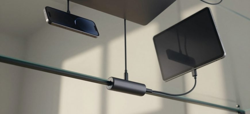 Modern devices connected with USB-C cables on a desk