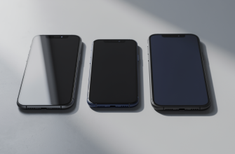 Three compact flagship phones on a table