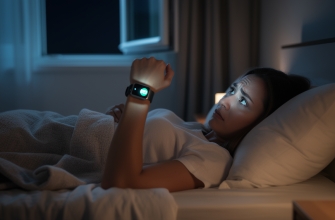 Person checking smartwatch sleep data in bed